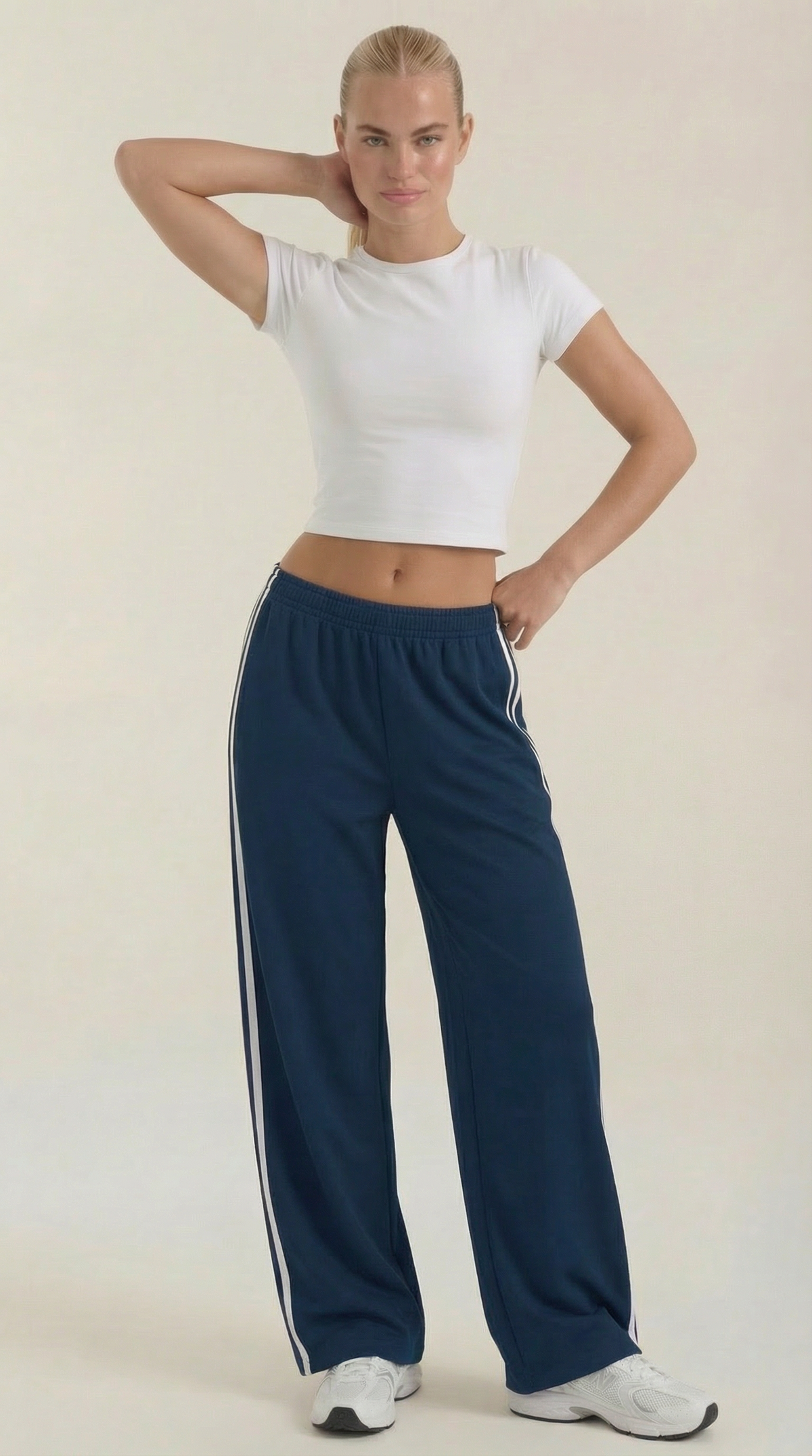 Trainerhose mit weitem Bein, Seitenstreifen und Kordelzug für Damen - Blau