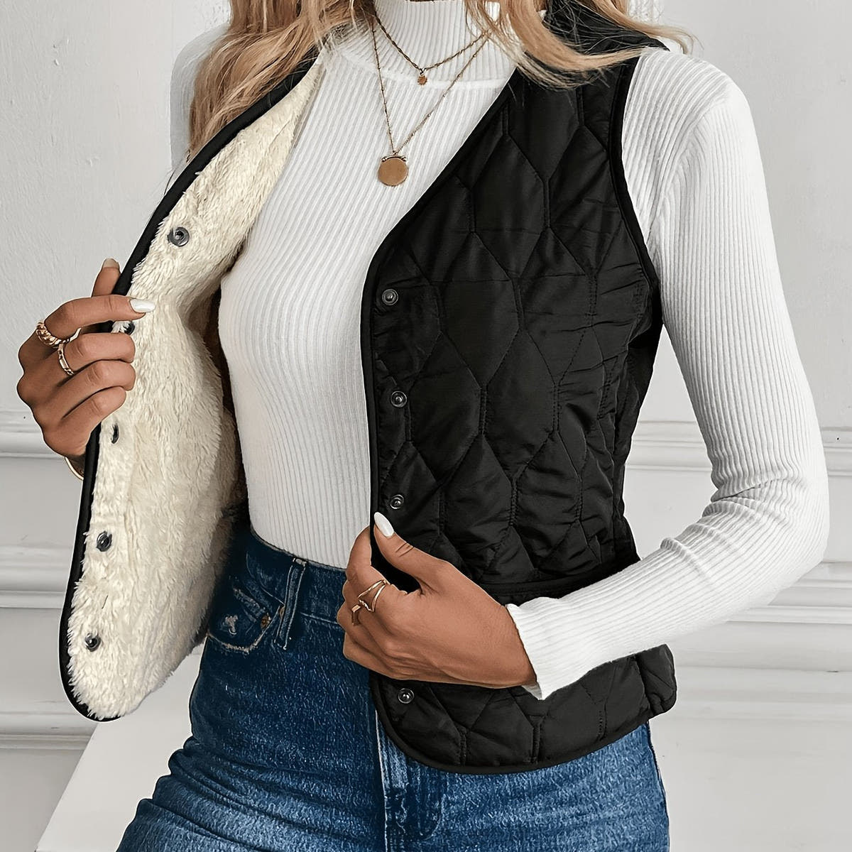 Gilet zum Wenden mit Steppseite und Sherpa-Struktur