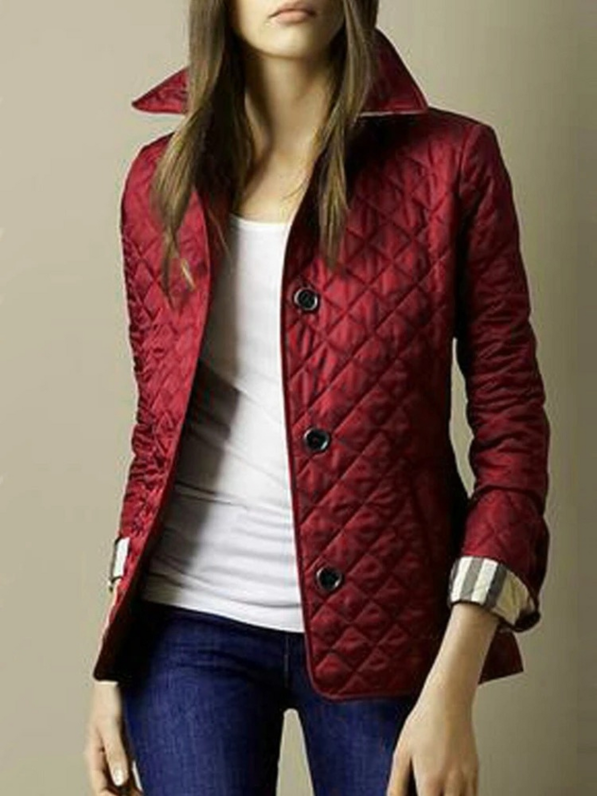 Steppjacke mit Rautensteppung und Gürtelpasse am Rücken