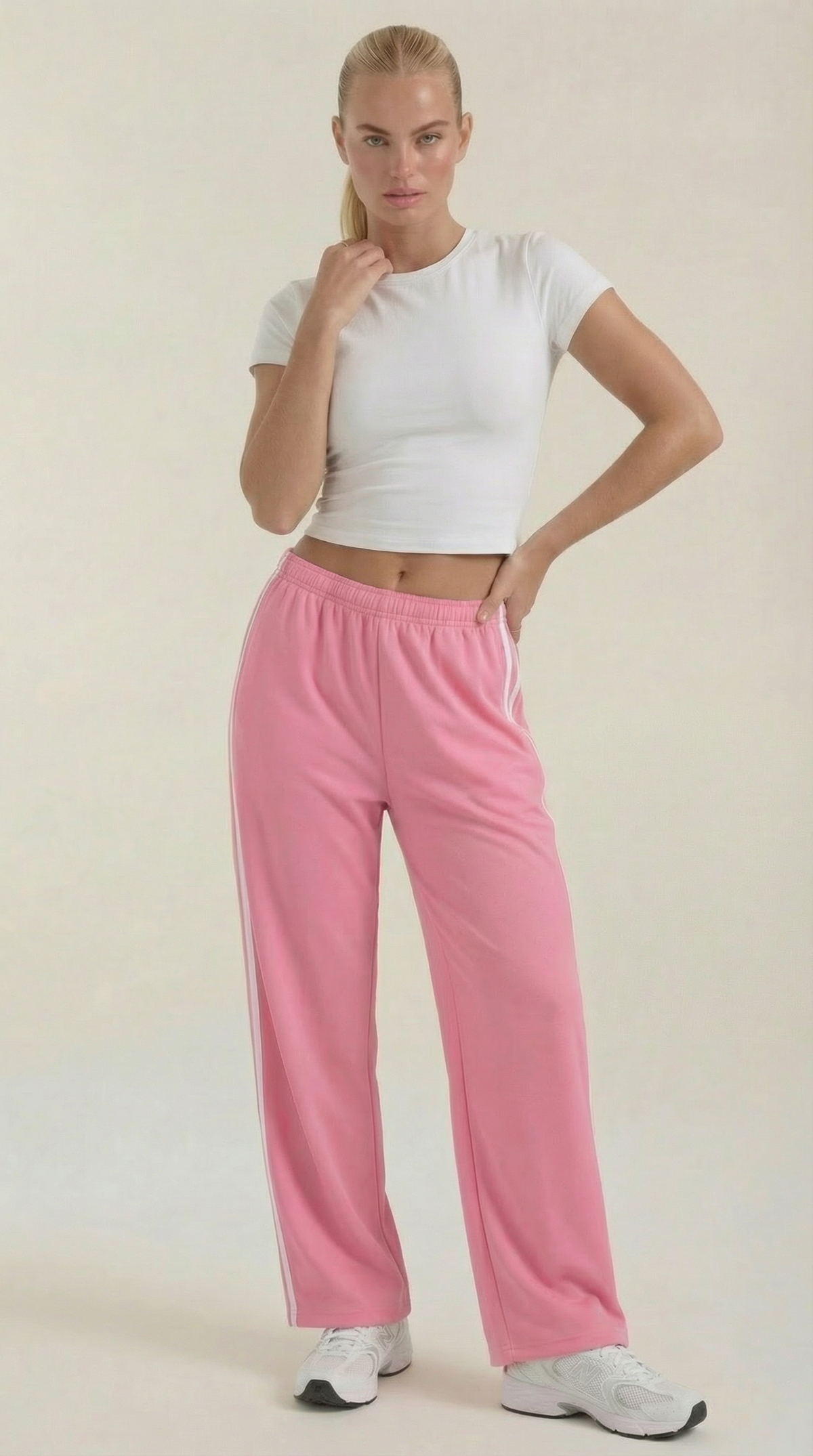 Trainerhose mit weitem Bein, Seitenstreifen und Kordelzug für Damen - Rosa