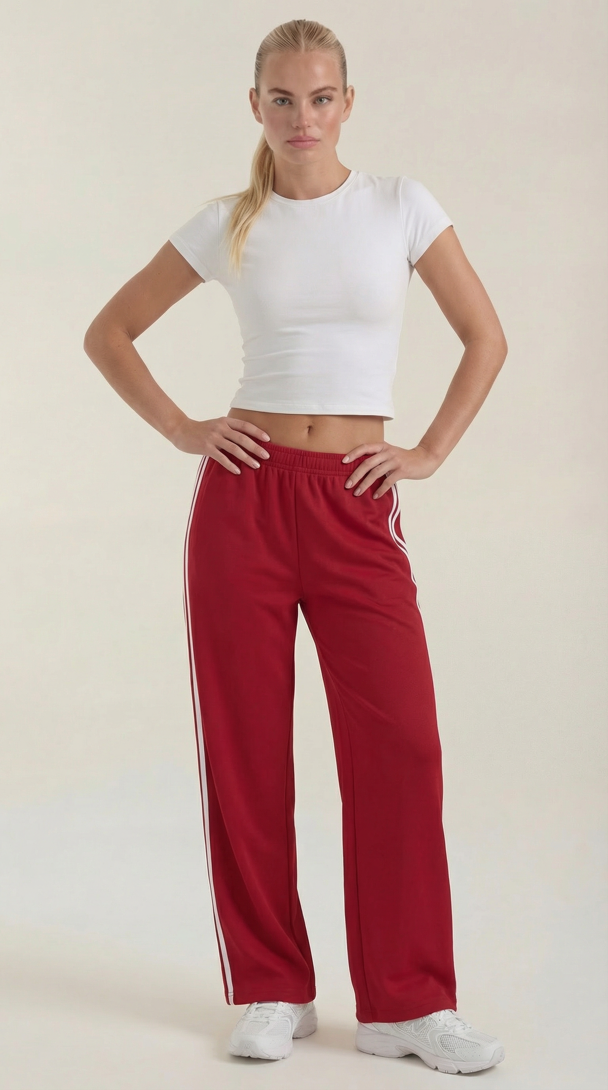 Trainerhose mit weitem Bein, Seitenstreifen und Kordelzug für Damen - Rot