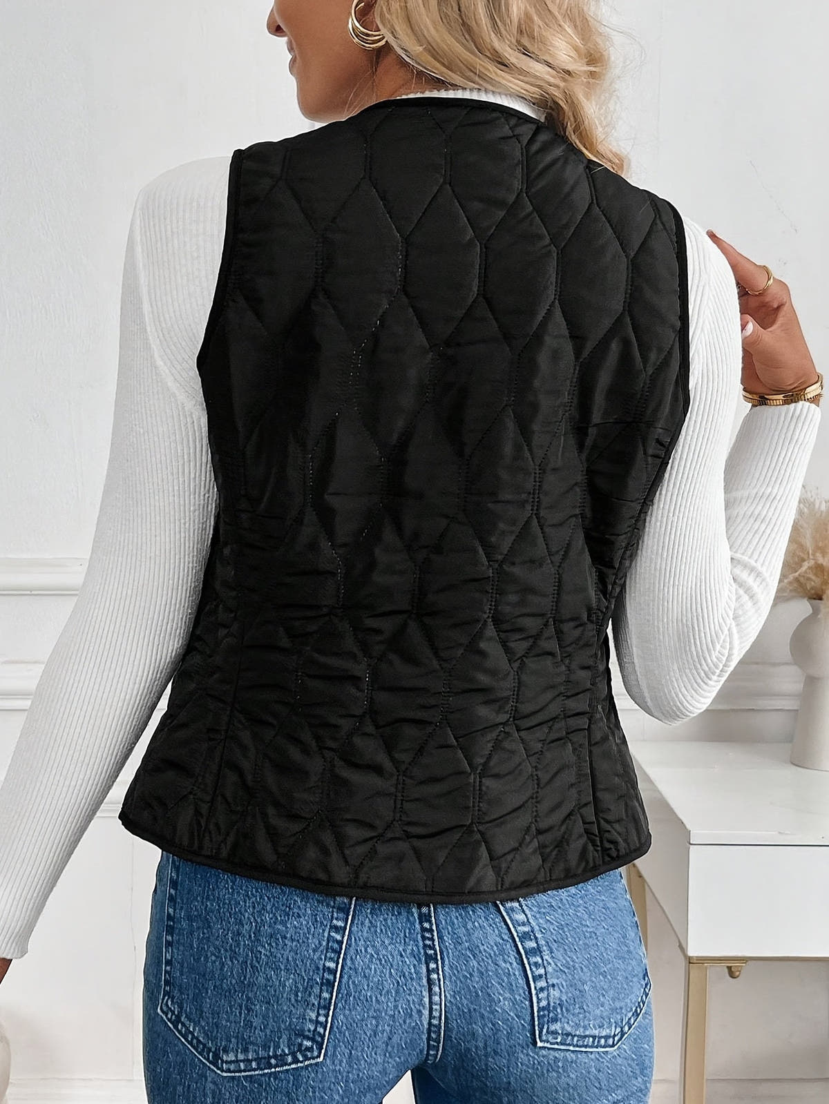Gilet zum Wenden mit Steppseite und Sherpa-Struktur