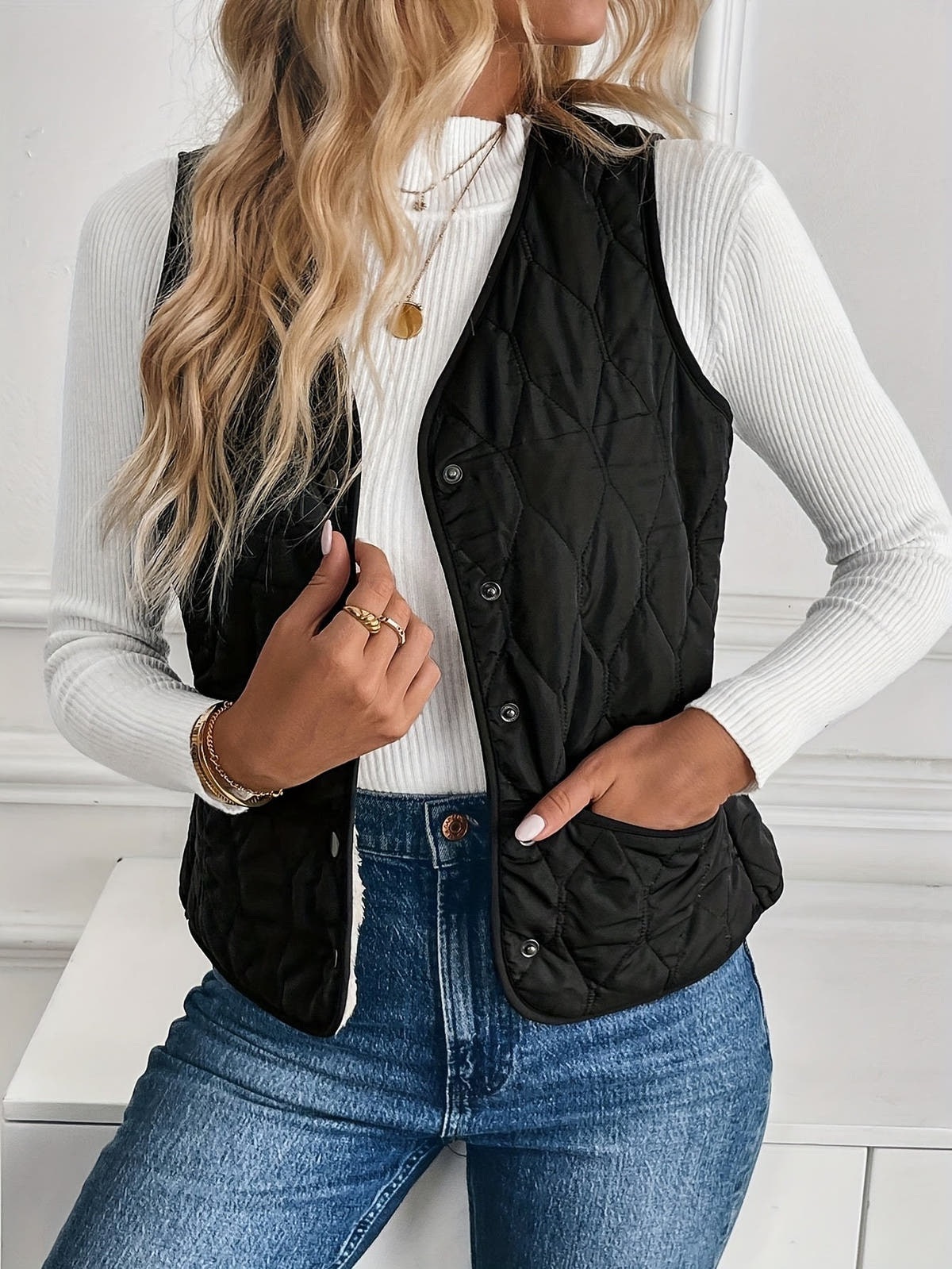 Gilet zum Wenden mit Steppseite und Sherpa-Struktur