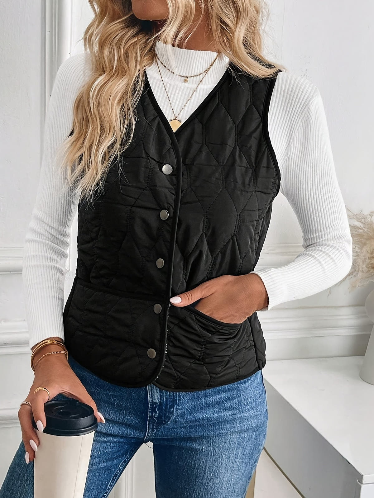 Gilet zum Wenden mit Steppseite und Sherpa-Struktur