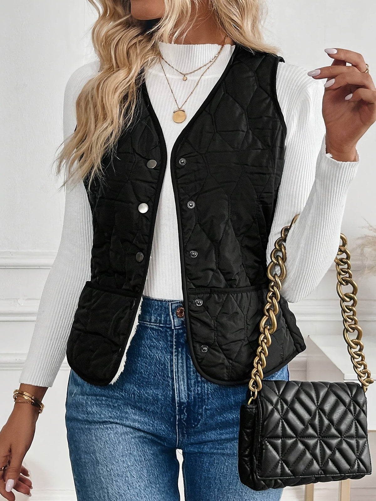 Gilet zum Wenden mit Steppseite und Sherpa-Struktur