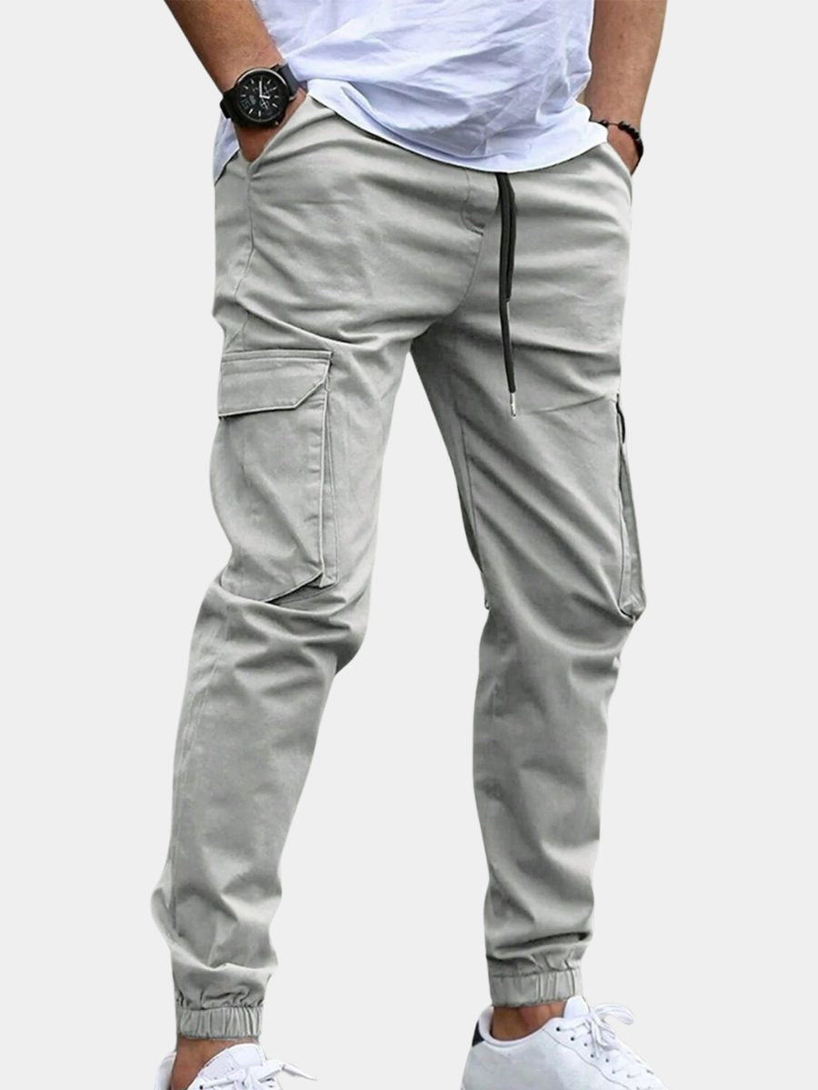 Jogging Hosen Herren locker mit Cargotaschen, schmal zulaufendes Bein