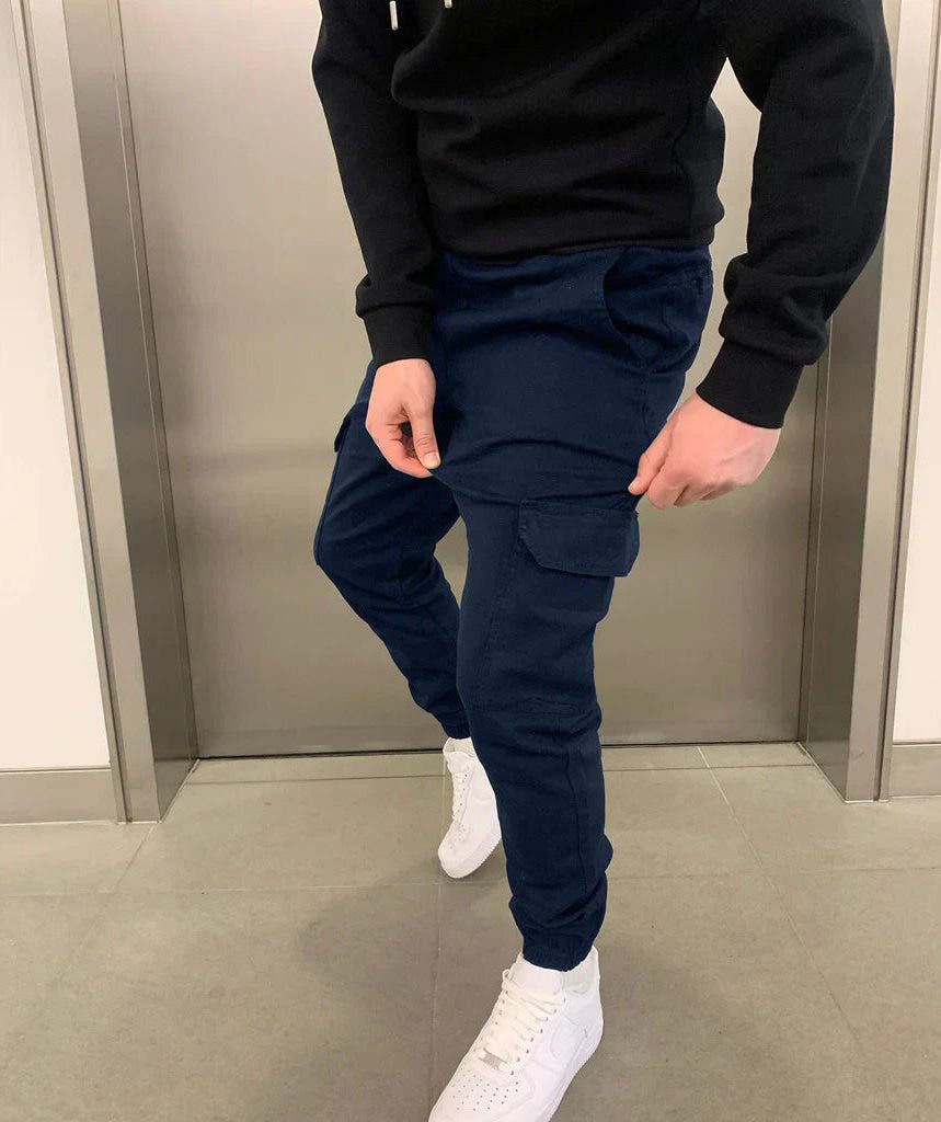 Jogging Hosen Herren locker mit Cargotaschen, schmal zulaufendes Bein