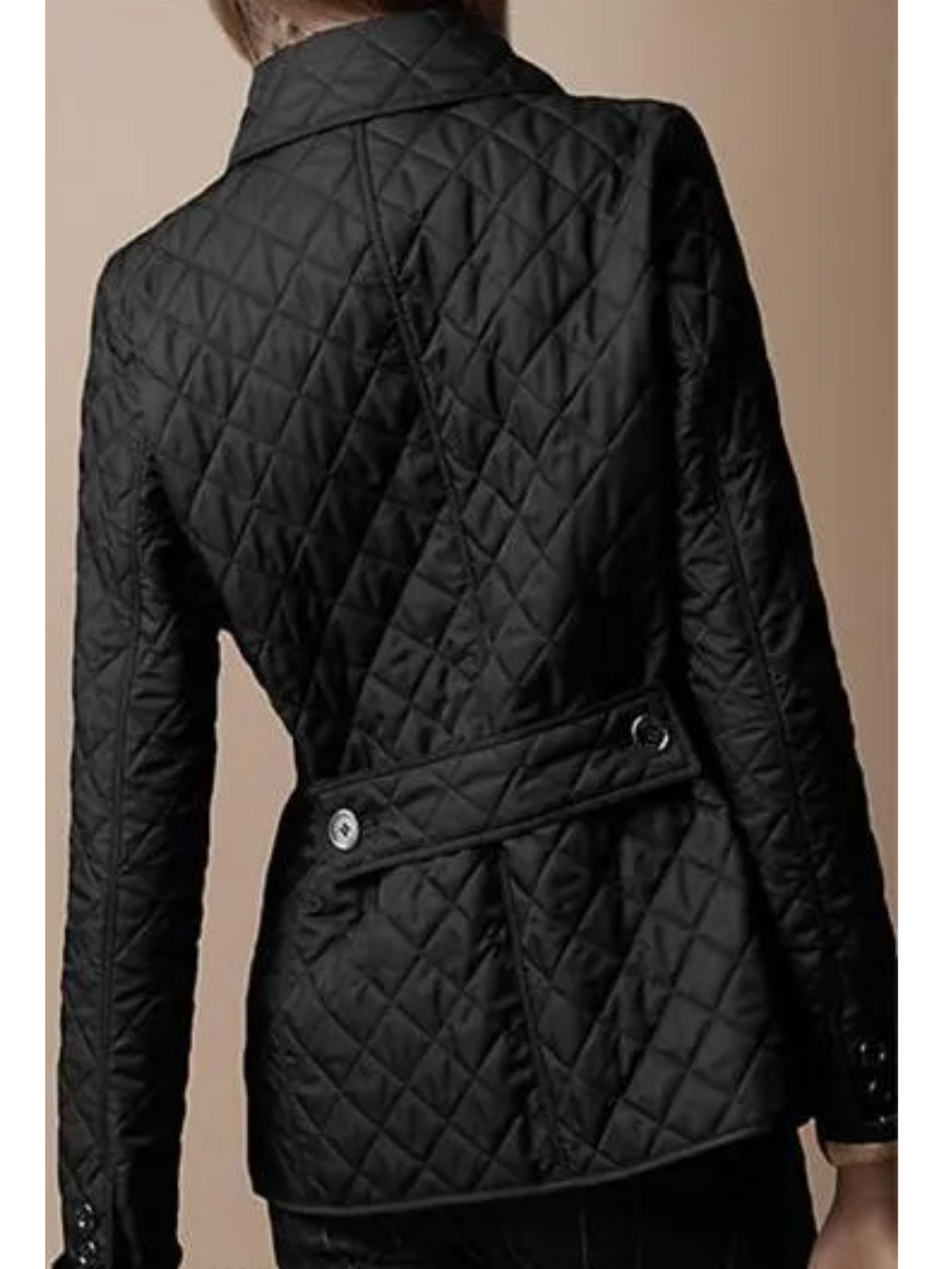 Steppjacke mit Rautensteppung und Gürtelpasse am Rücken