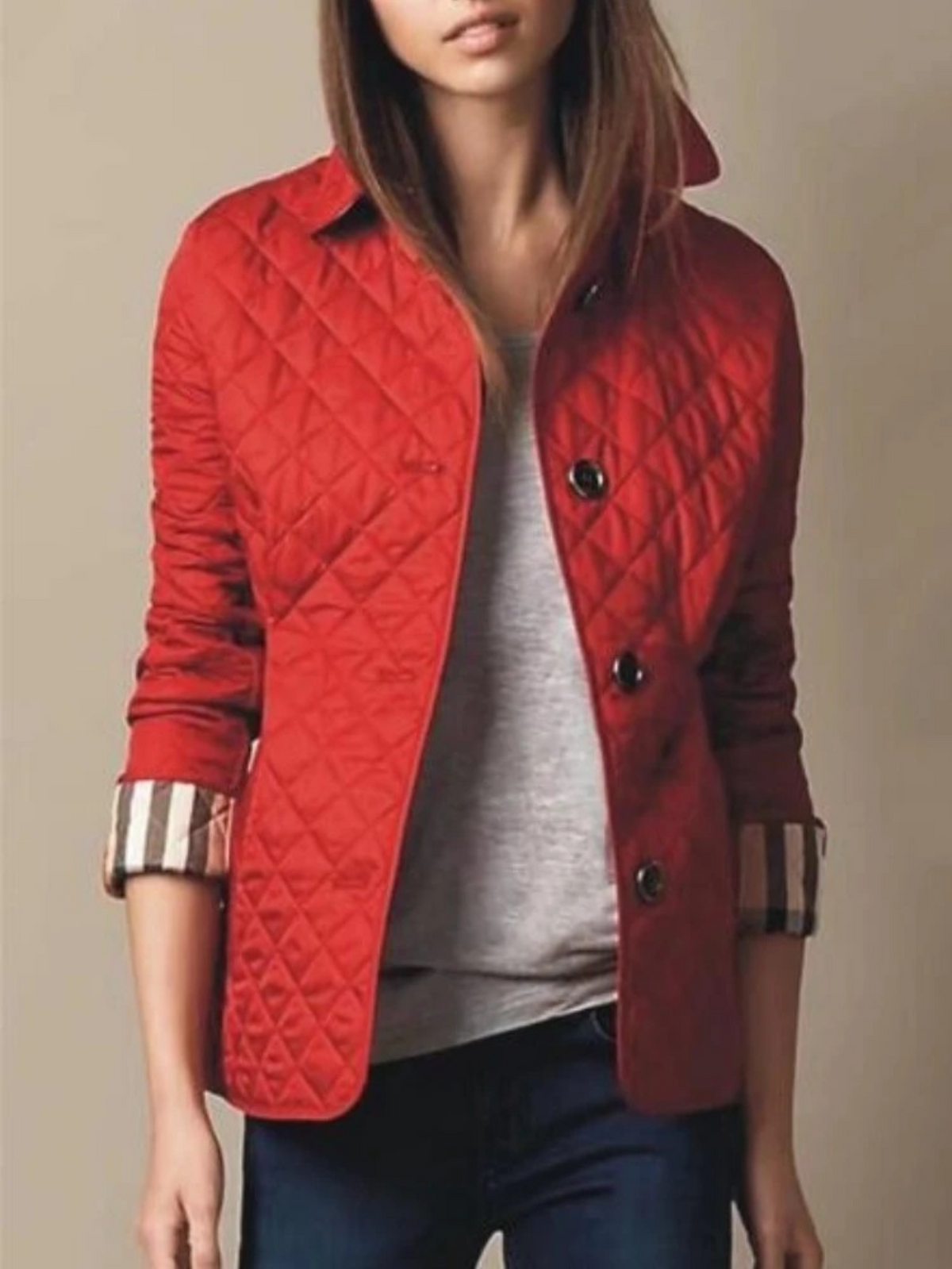 Steppjacke mit Rautensteppung und Gürtelpasse am Rücken