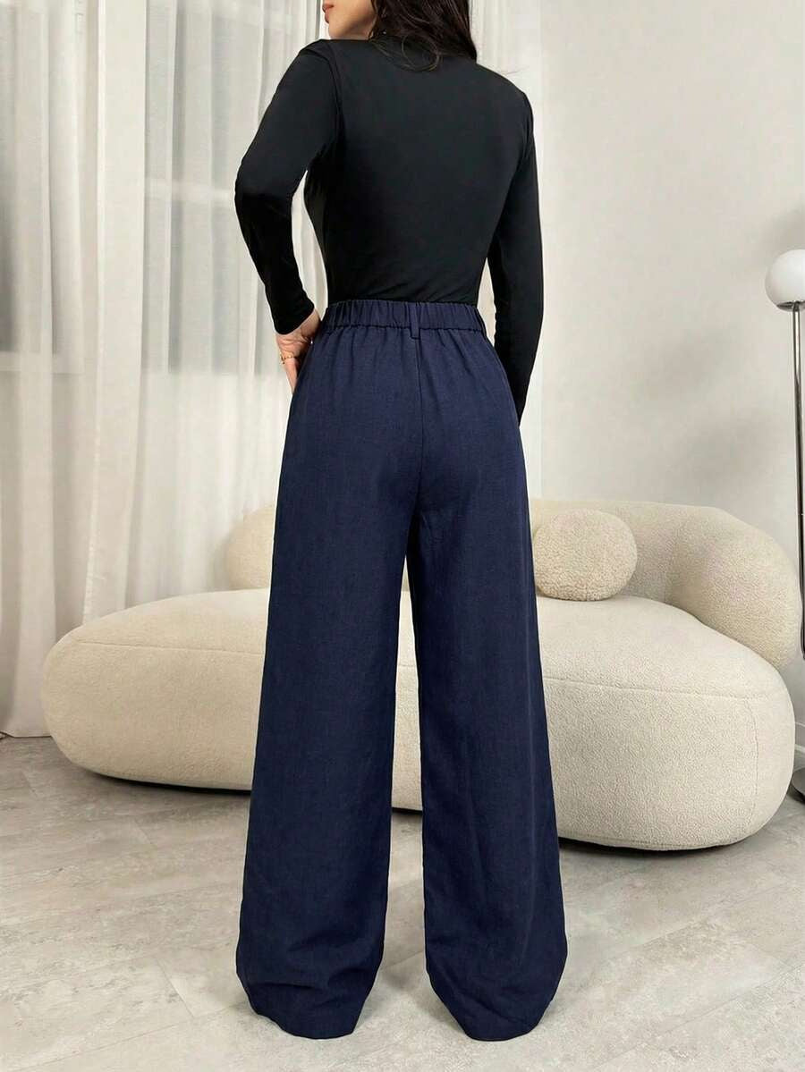 Stoffhose mit Bundfalten und weitem Bein